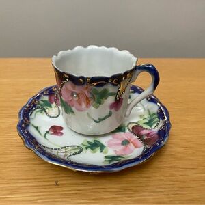 Floral Blue and White Teacup and Saucer Set